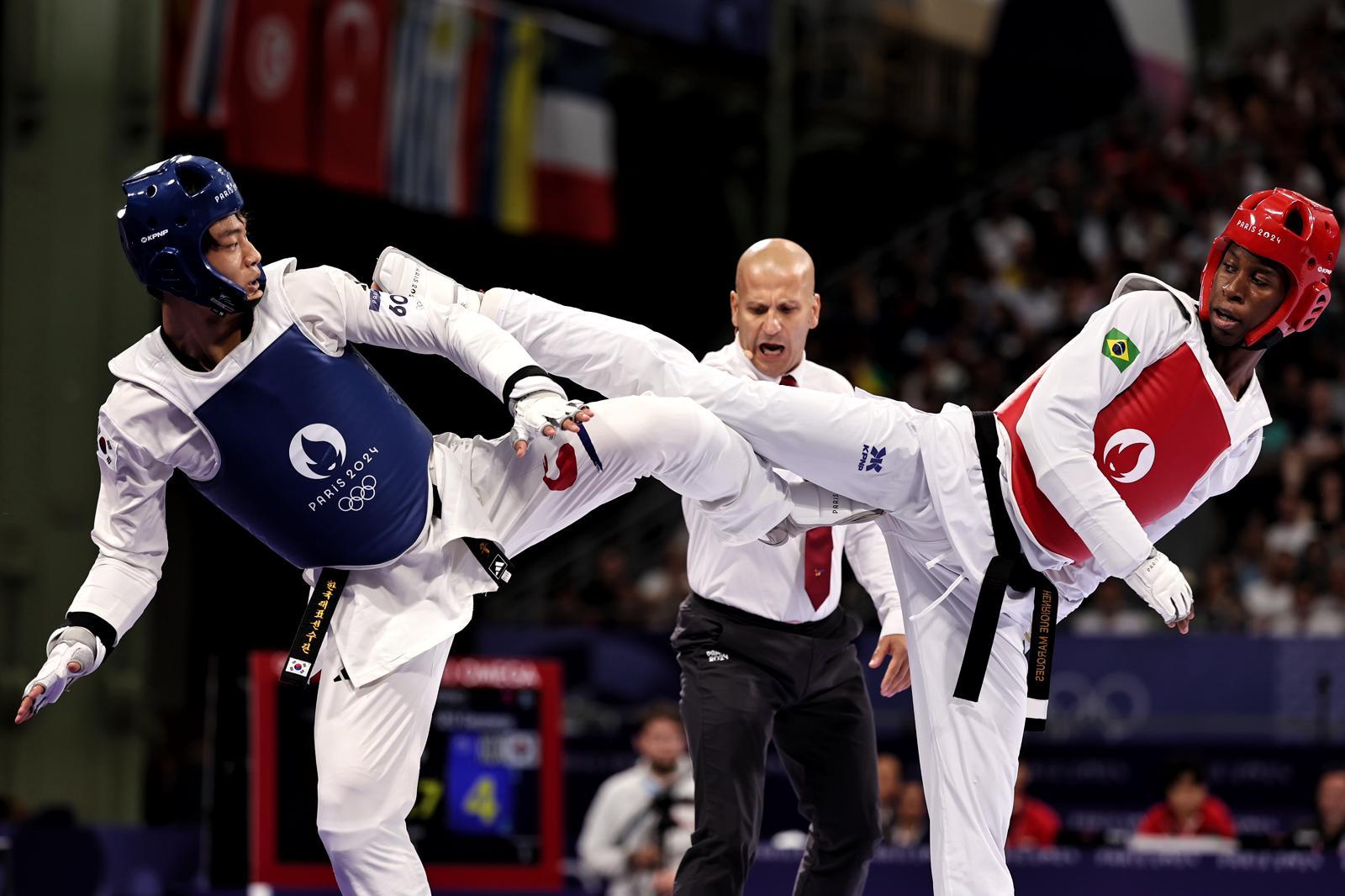 Taekwondo - Henrique Marques na disputa das quartas de final - Foto: Miriam Jeske/COB