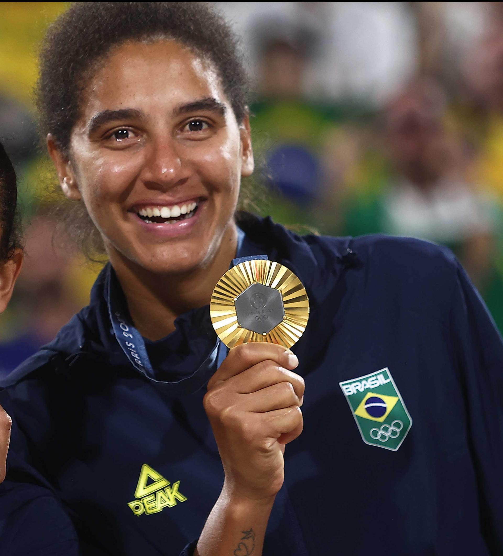 A dupla brasileira Duda e Ana Patrícia e vencem as canadenses Melissa e Brandie e conquistam a medalha de ouro. Foto: Luiza Moraes/COB.